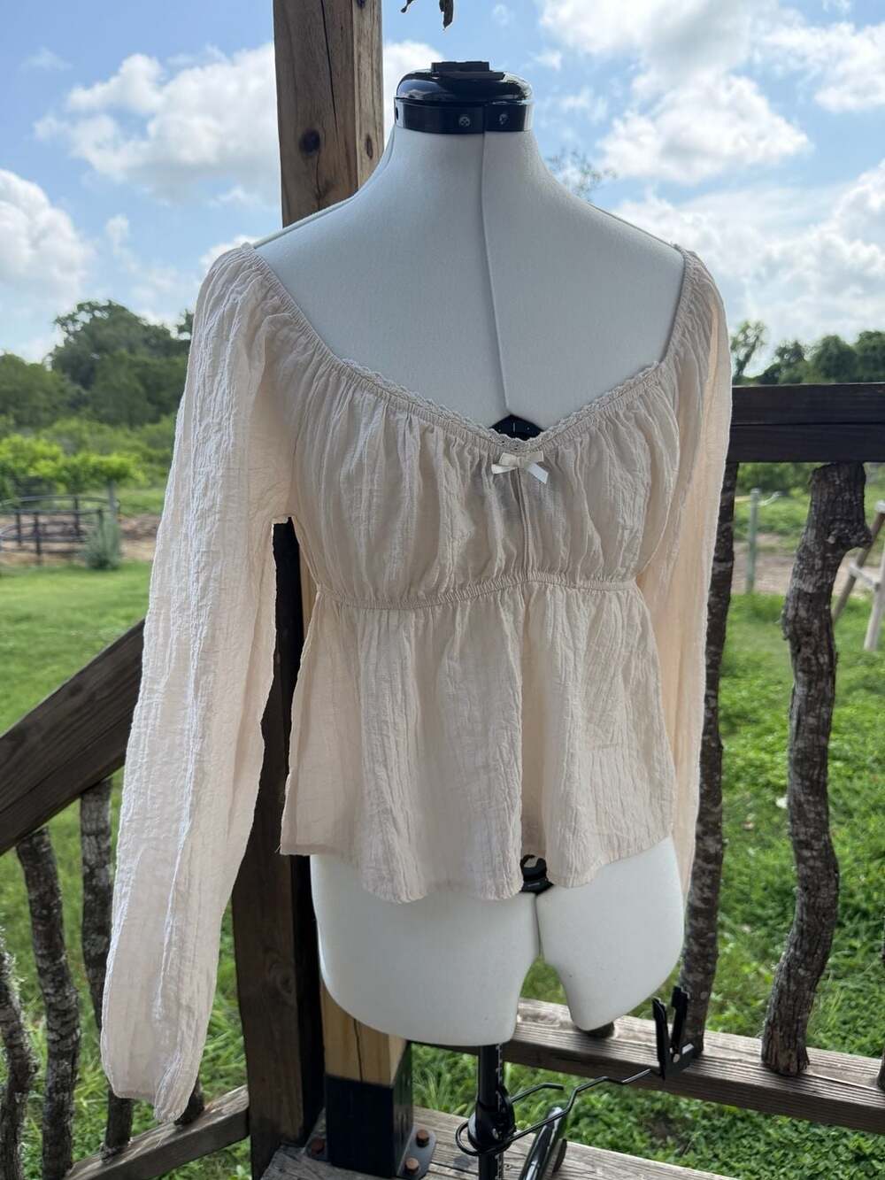 Frankee & Skylarr Long Sleeve Ruched Babydoll Top with Bow Detail